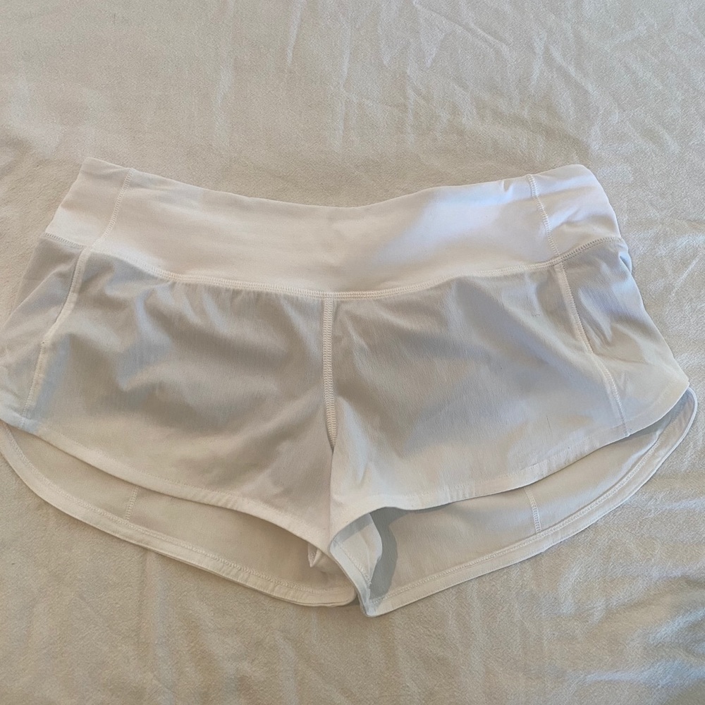 White Lululemon running shorts
